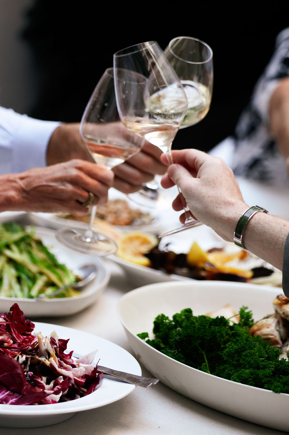 Guest savouring a bite of food at a relaxed gathering